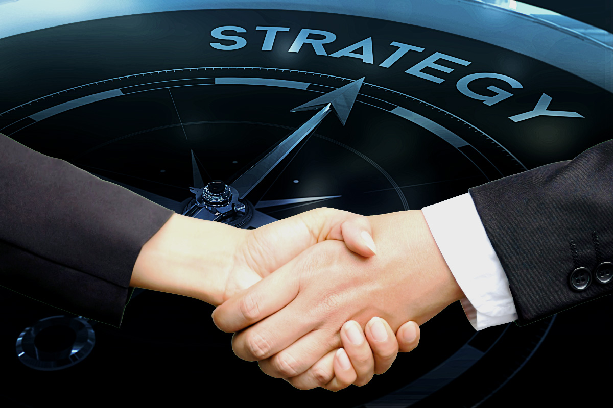 BZV-COA-1a-Strategic-Context-Session-Handshake-Alignment. Close-up of a professional handshake in front of a tactical compass pointing to 'STRATEGY,' representing the mandatory entry point and situational awareness alignment for BeeZee Vision mission partners. Alt Text (Spanish): Primer plano de un apretón de manos profesional frente a una brújula táctica que apunta a 'STRATEGY', representando el punto de entrada obligatorio y la alineación de conciencia situacional para los socios de misión de BeeZee Vision.